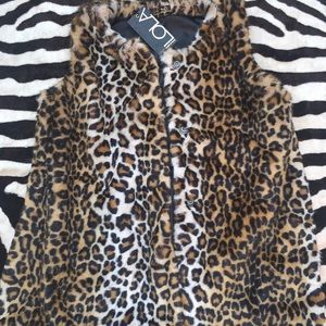 Faux fur jacket vest.